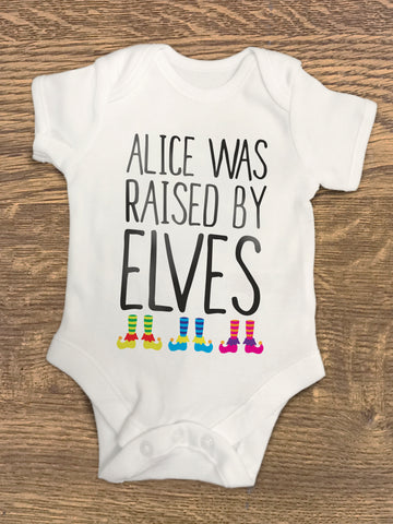 BB13 - Raised By Elves Personalised Christmas Baby Vest