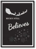 CC05 - Personalised Christmas Name inserted Still Believes Canvas Print.  Available in Black and Red.