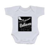 CC05 - Personalised Christmas Name inserted Still Believes in Black or Red Baby Vest