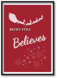 CC05 - Personalised Christmas Name inserted Still Believes Canvas Print.  Available in Black and Red.
