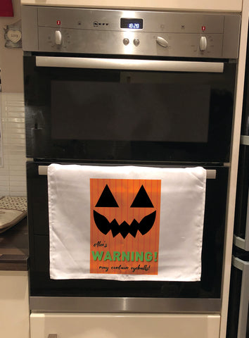Pumpkin Themed Halloween Warning May Contain Eyeballs Personalised Tea Towel