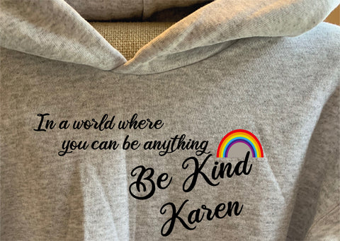 IN A WORLD WHERE YOU CAN BE ANYTHING, BE KIND - RAINBOW HOODIES
