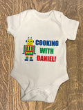 CA10 - Personalised Cooking with (Name) Baby Vest